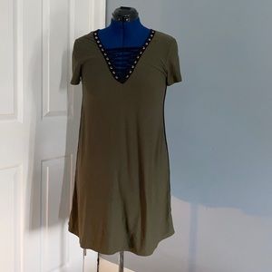Army green dress with deep zig zag v-neck.